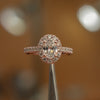 side view luxury oval rose gold diamond set shoulders halo lab grown diamond engagement ring