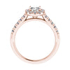 studio shot of luxury rose gold diamond set shoulders halo lab grown diamond engagement ring