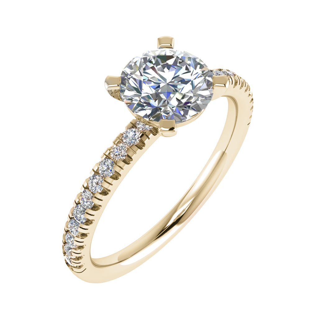 side shot of round yellow gold diamond set shoulders lab grown diamond engagement ring