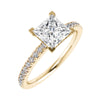 frontal side image of luxury princess yellow gold diamond set shoulders lab grown diamond engagement ring