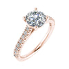 frontal side image of luxury round yellow gold diamond set shoulders lab grown diamond engagement ring